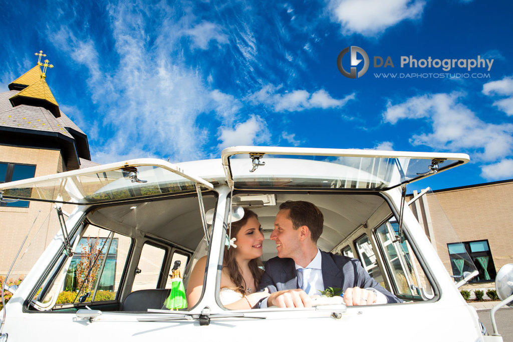 Wedding Picture of Bride and Groom in vintage Volkswagen van