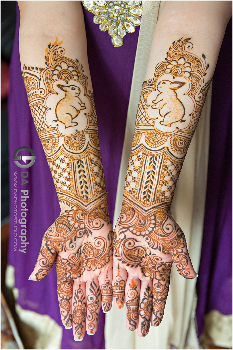 Bride's henna at pre-wedding ceremony