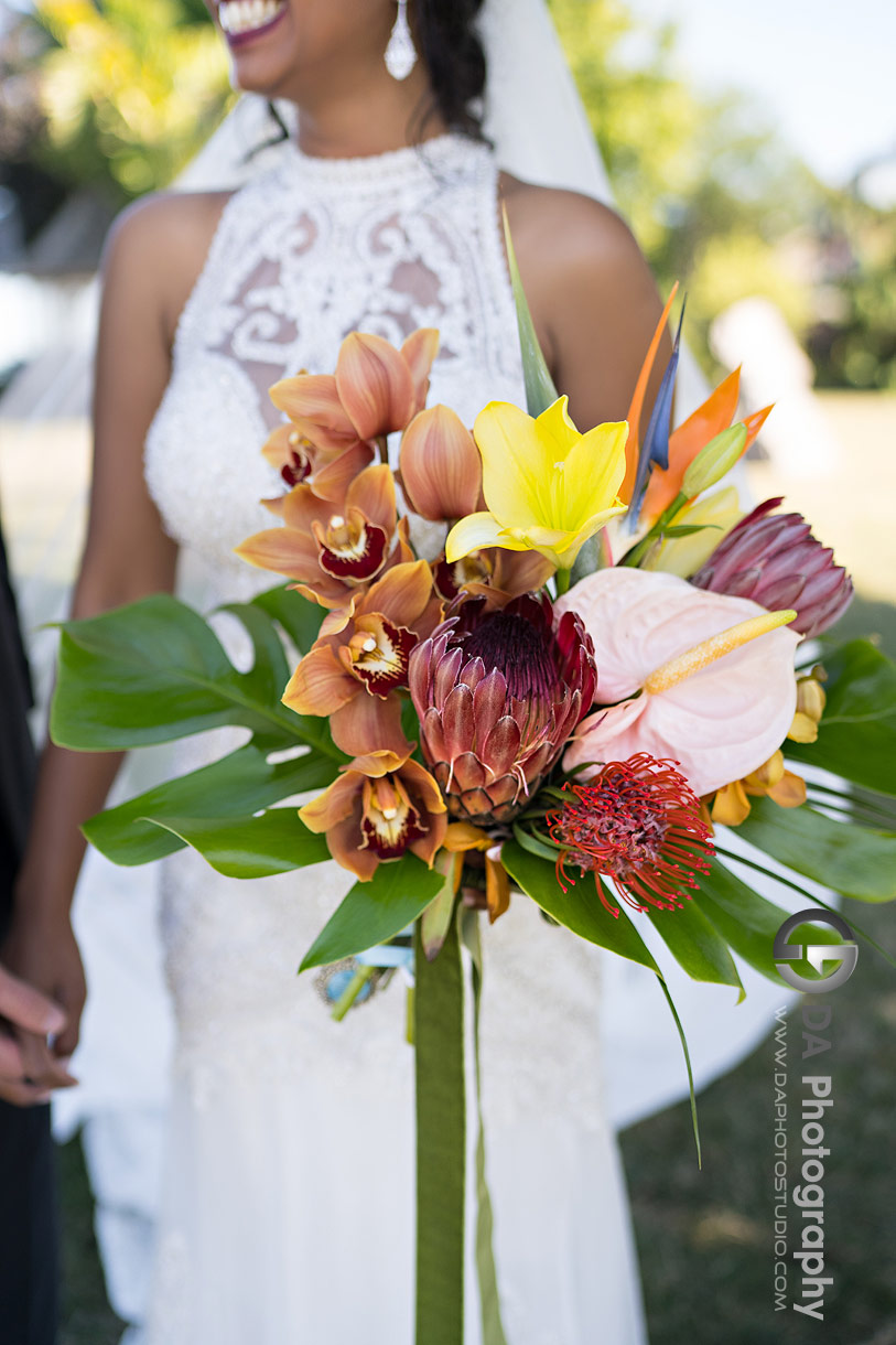 Bride with with wedding flower bouquet at Edgewater Manor