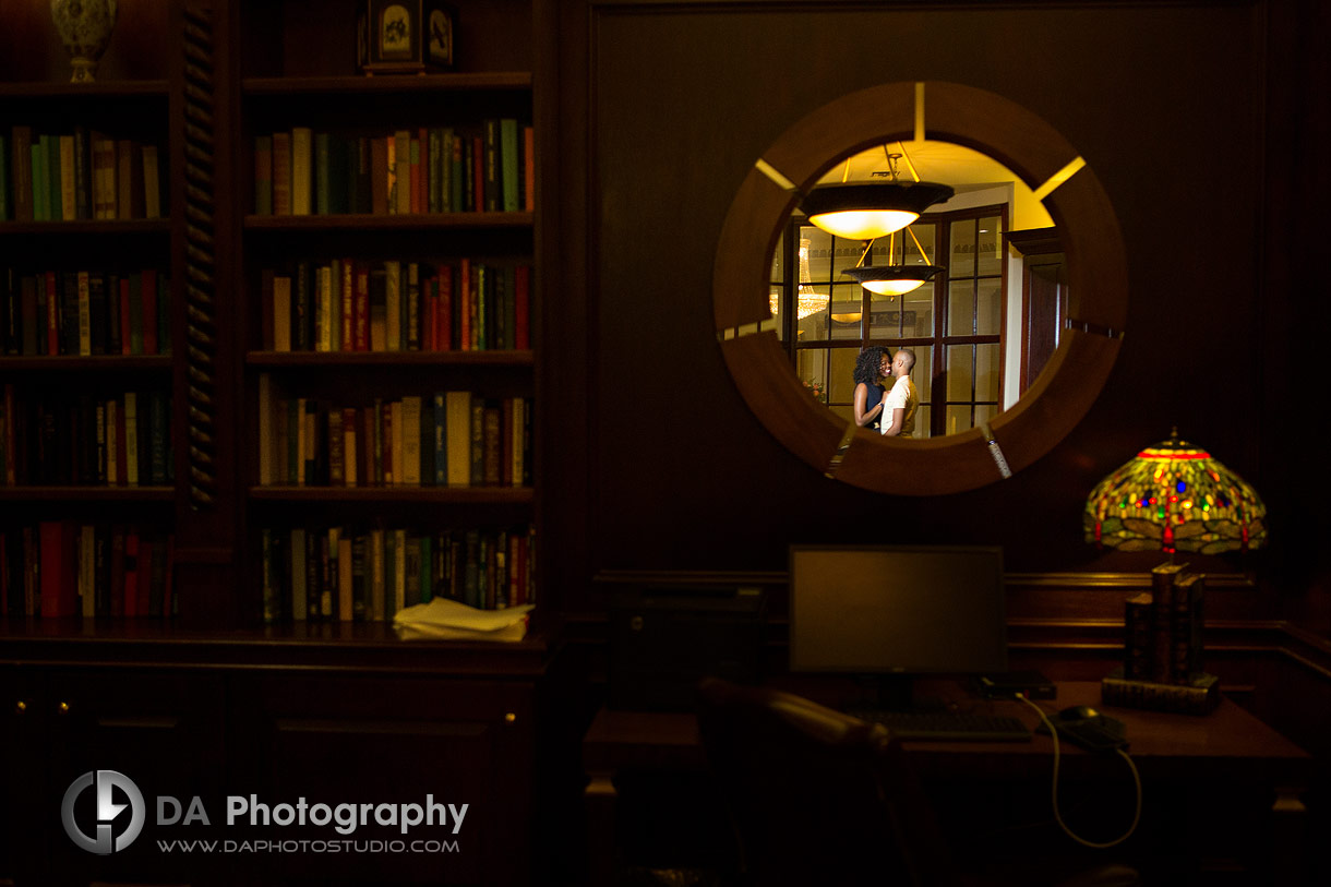 Reflection photo of a Couple in the Library at Queen's Landing Hotel