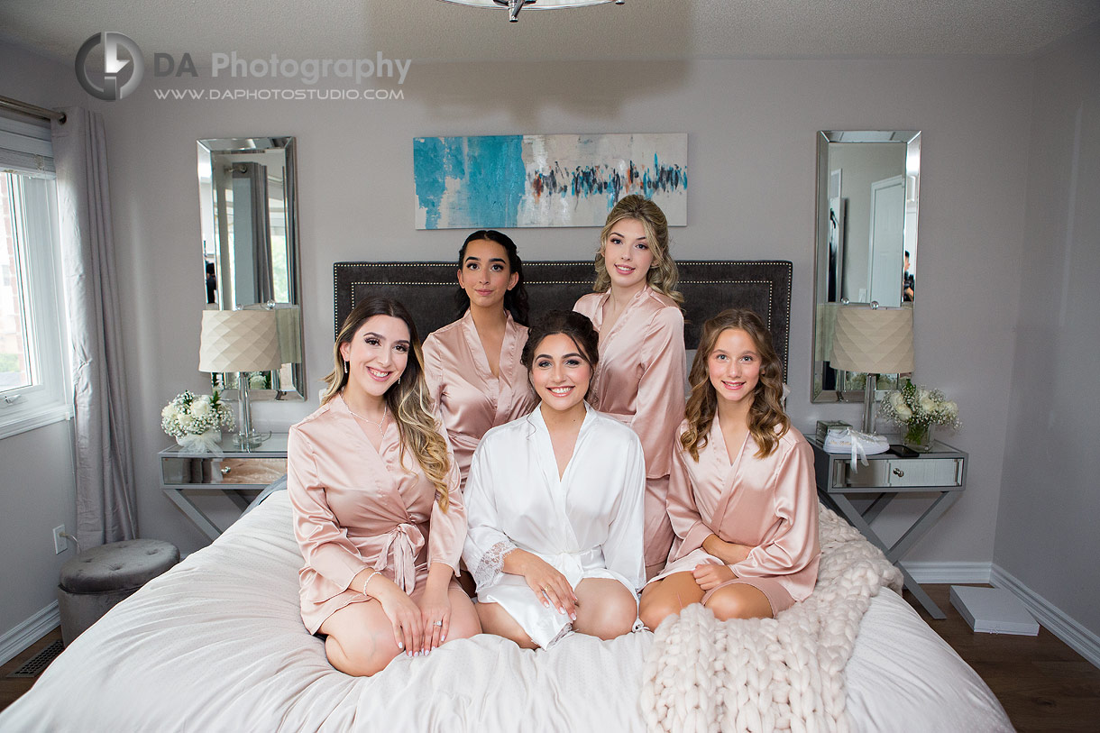 Bride with her bridesmaids in their morning robes