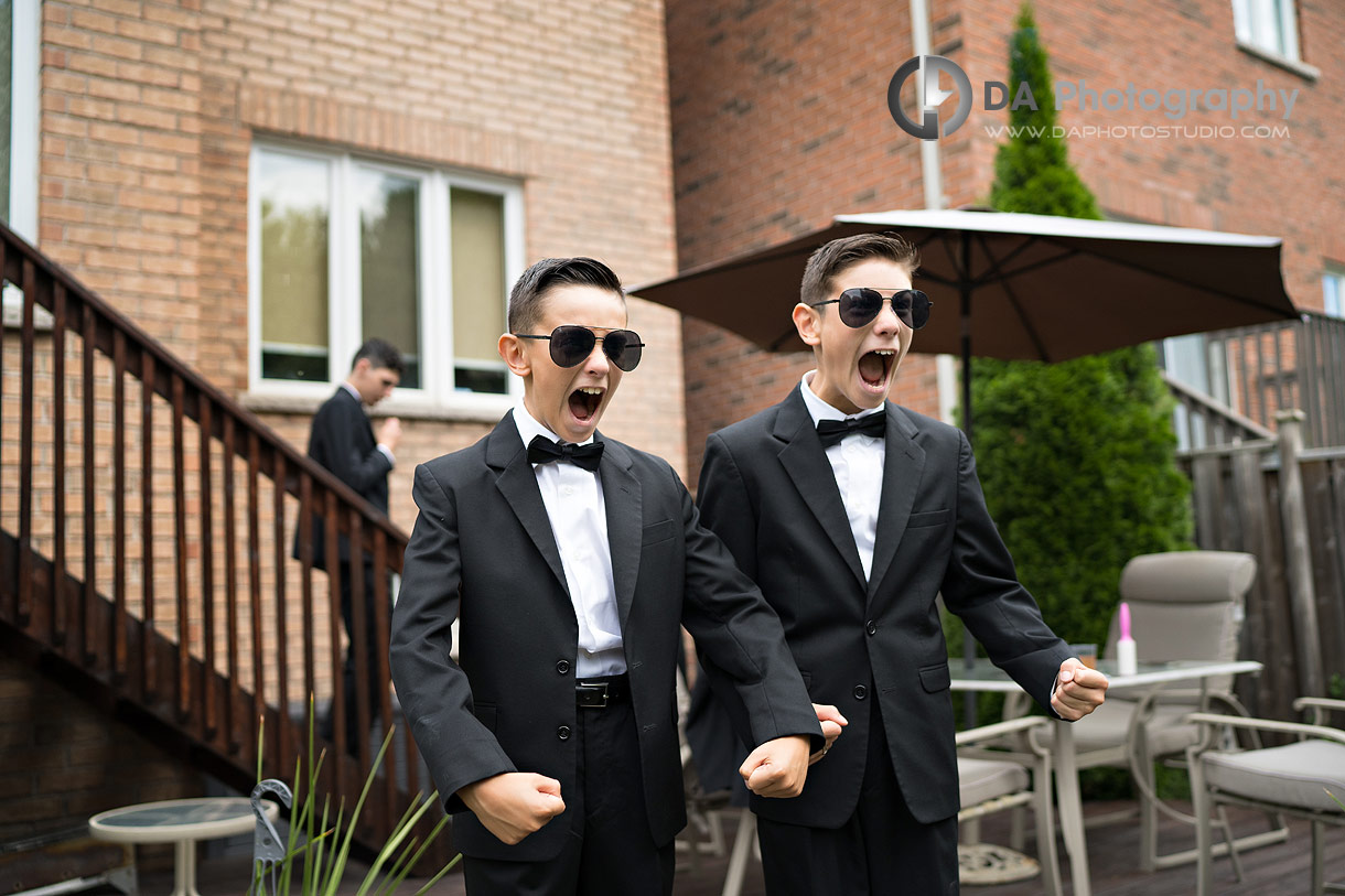 Fun photo of ring boys getting ready for a wedding