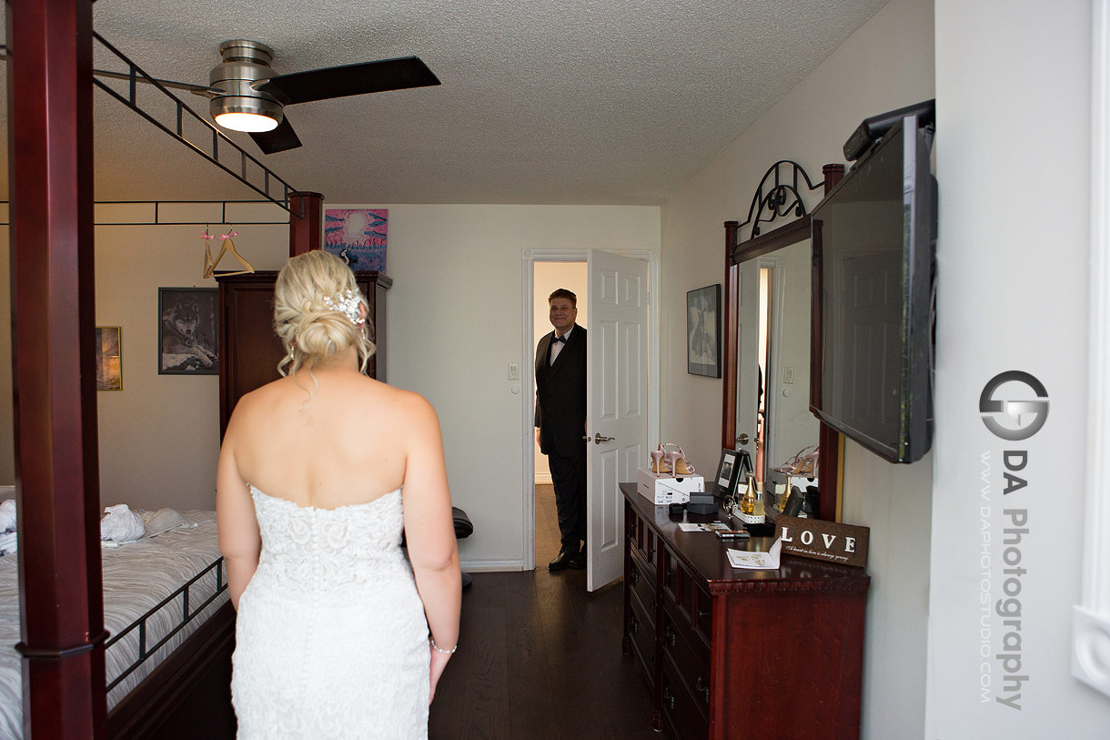 First look between bride and her dad on the wedding day