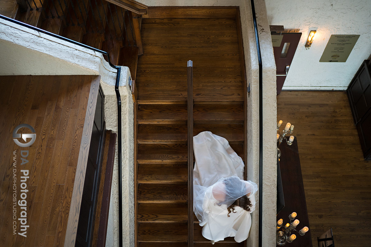 Bride on the stairs at Casa Loma