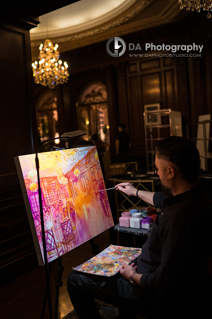 Casa Loma Live Painting artist in the Library