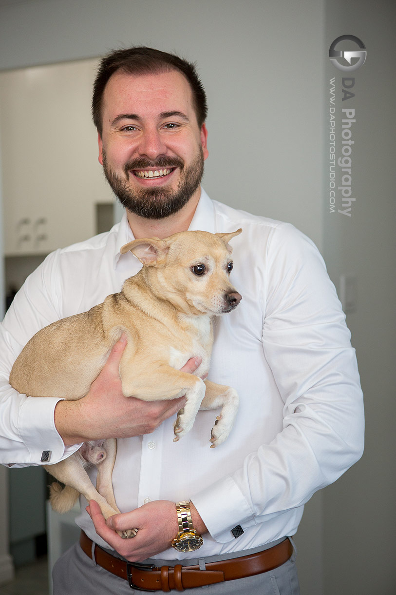 Photo of groom with his dog