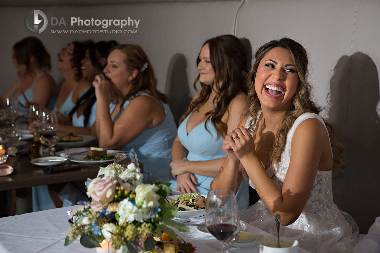 Documentary photos of a bride having fun during speeches