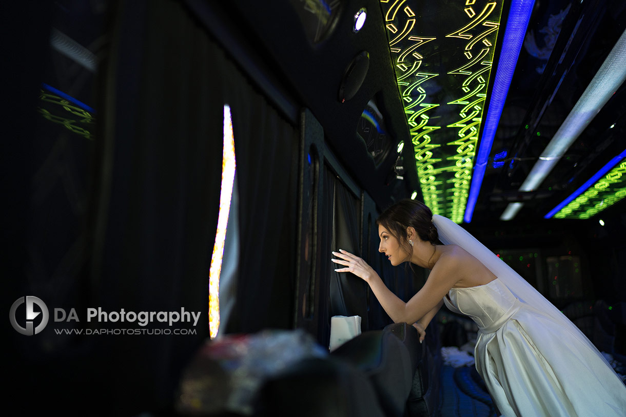 Bride in Limo looking at the church