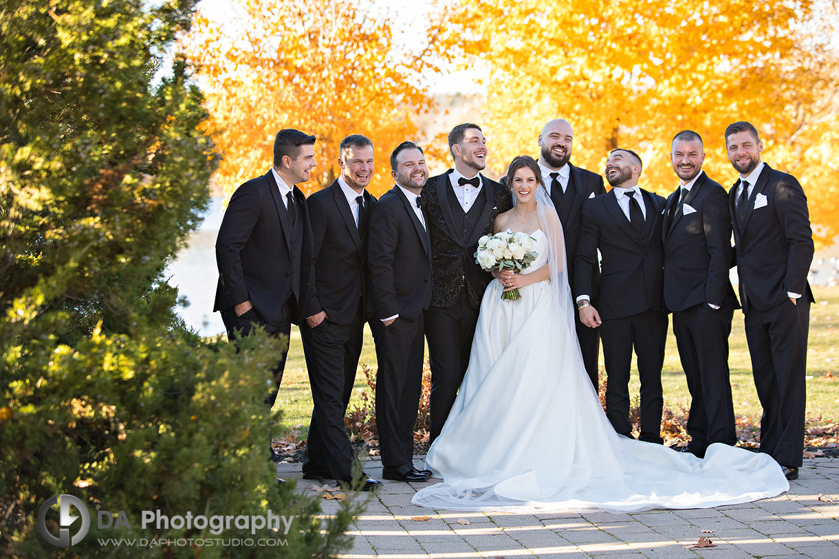 Bride with the groomsman's at Royal Ambassador