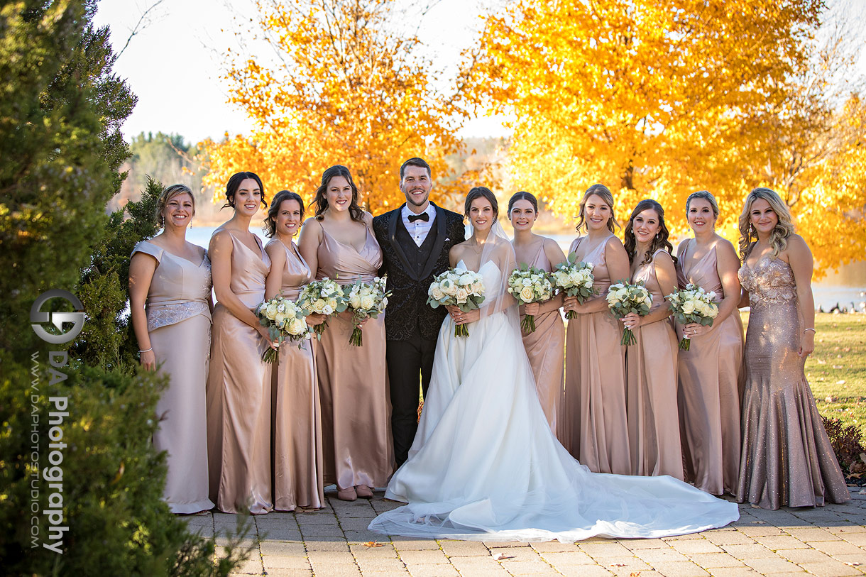 Groom with the bridesmaids at Royal Ambassador