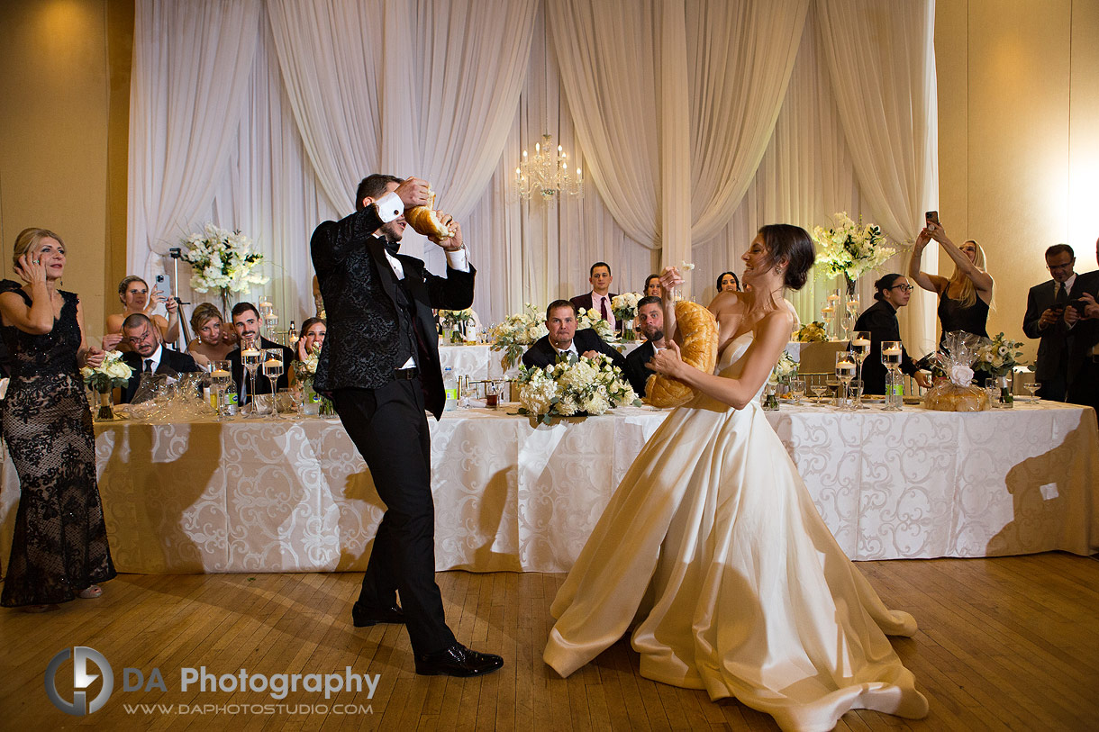 Breaking of the bread tradition on Greek Wedding