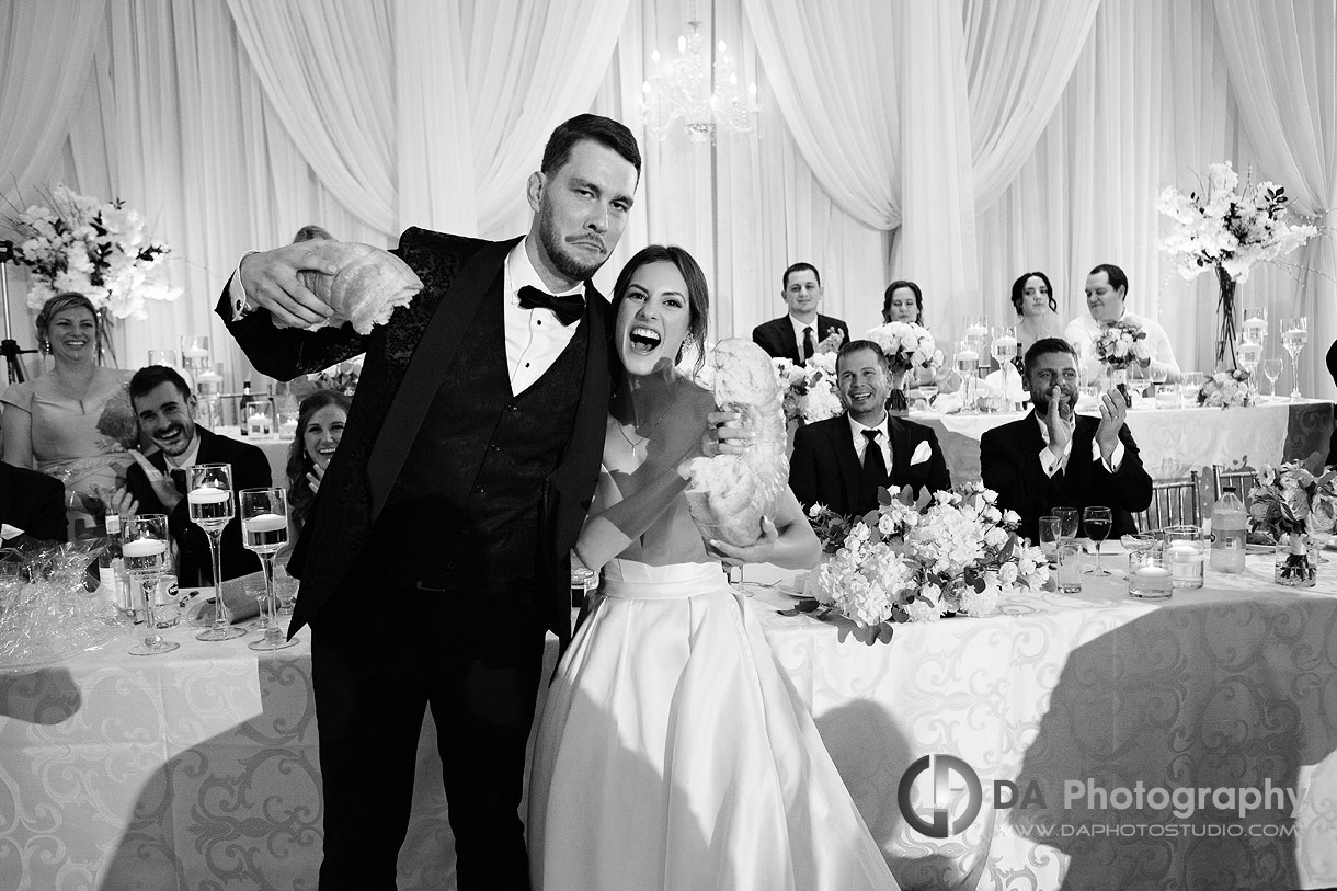 Bride and Groom after Breaking of the bread tradition on Greek Wedding