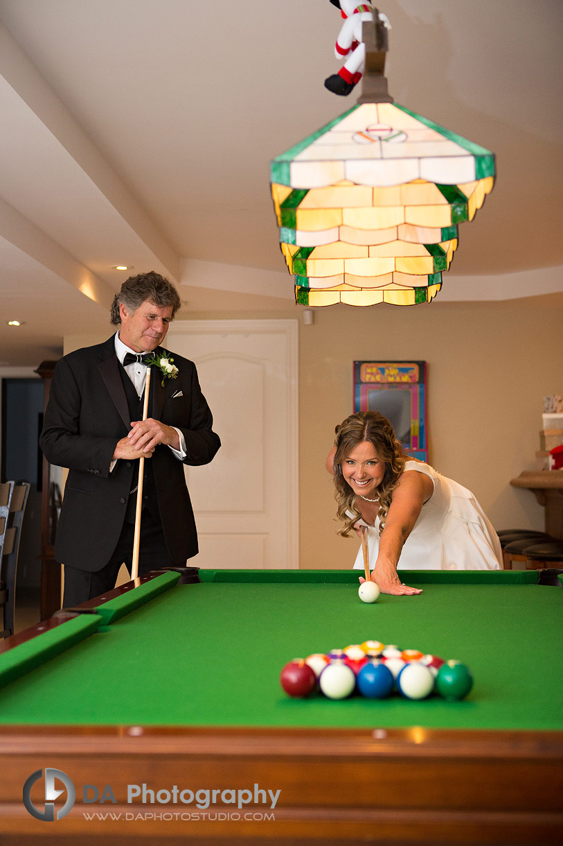 Photo of a Bride playing pool game