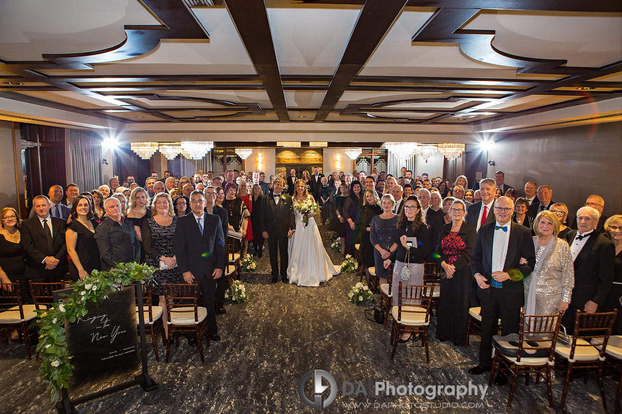 Group Photo of a wedding party in The Grandview Room at Whistle Bear