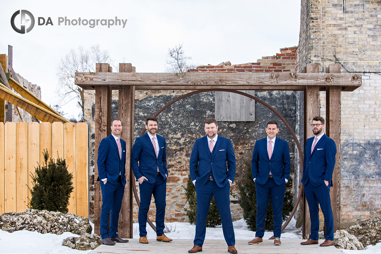 Groomsman at Elora Mill in Winter