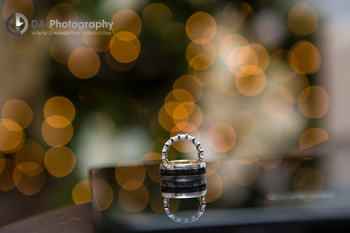 Wedding Rings with twinkling light in the background