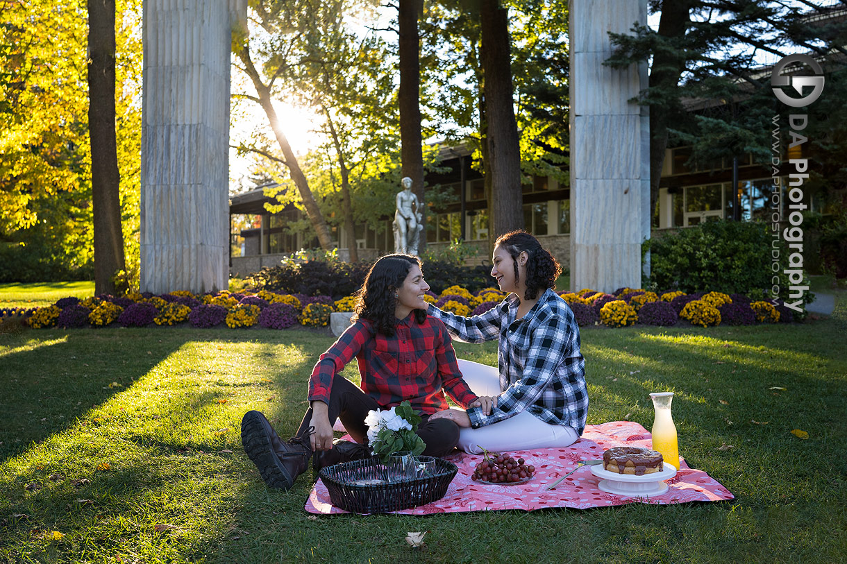 Picnic photos of same sex couple during golden hour