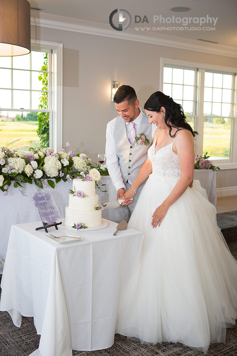 Bride and Groom cutting cake at Piper's Heath