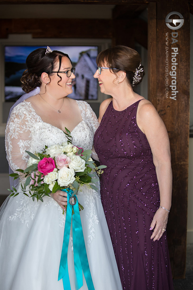 Photo of a bride with her mom at Cambridge Mill Bridal Suite