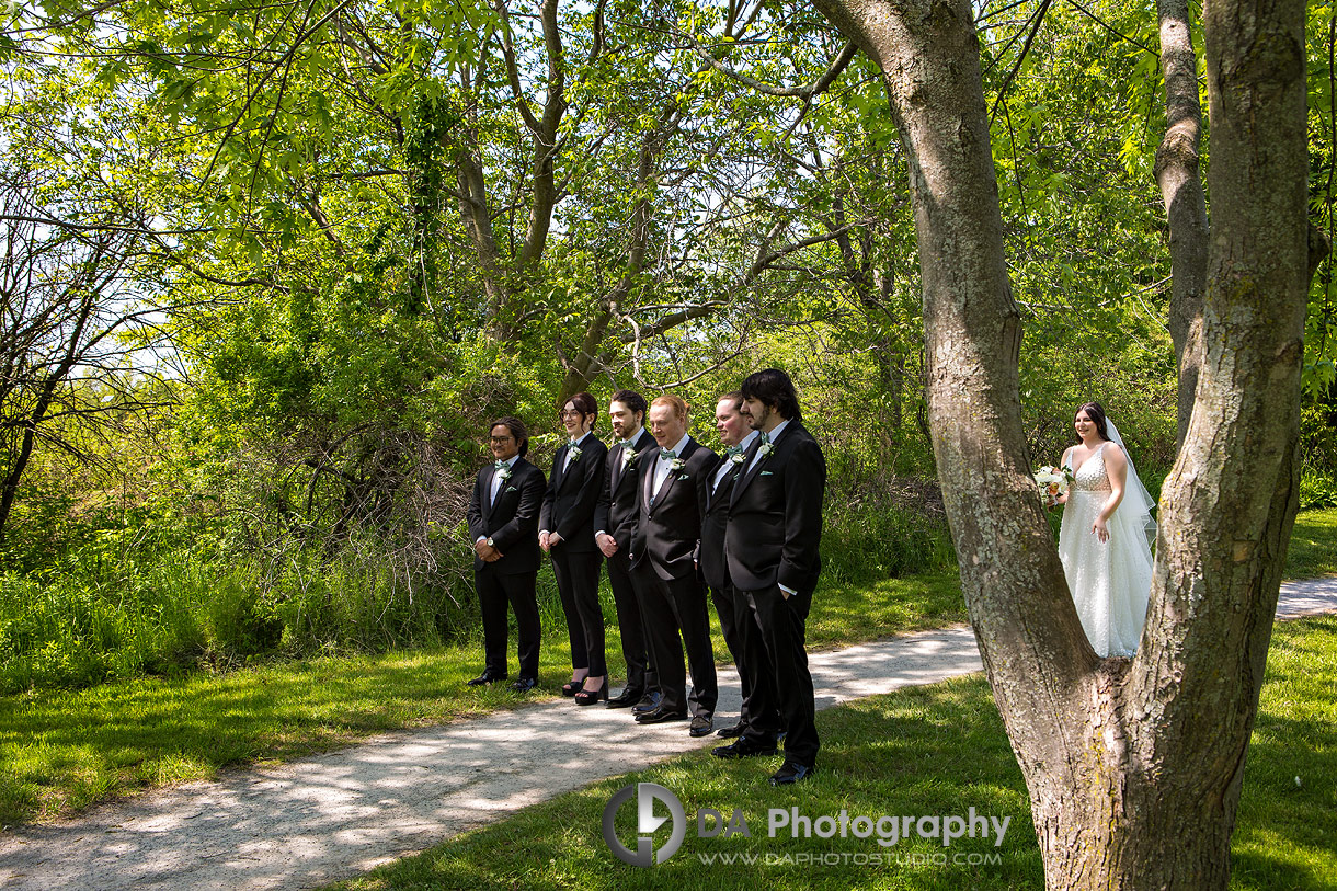 Photo of a bride reveal with the groomsman 