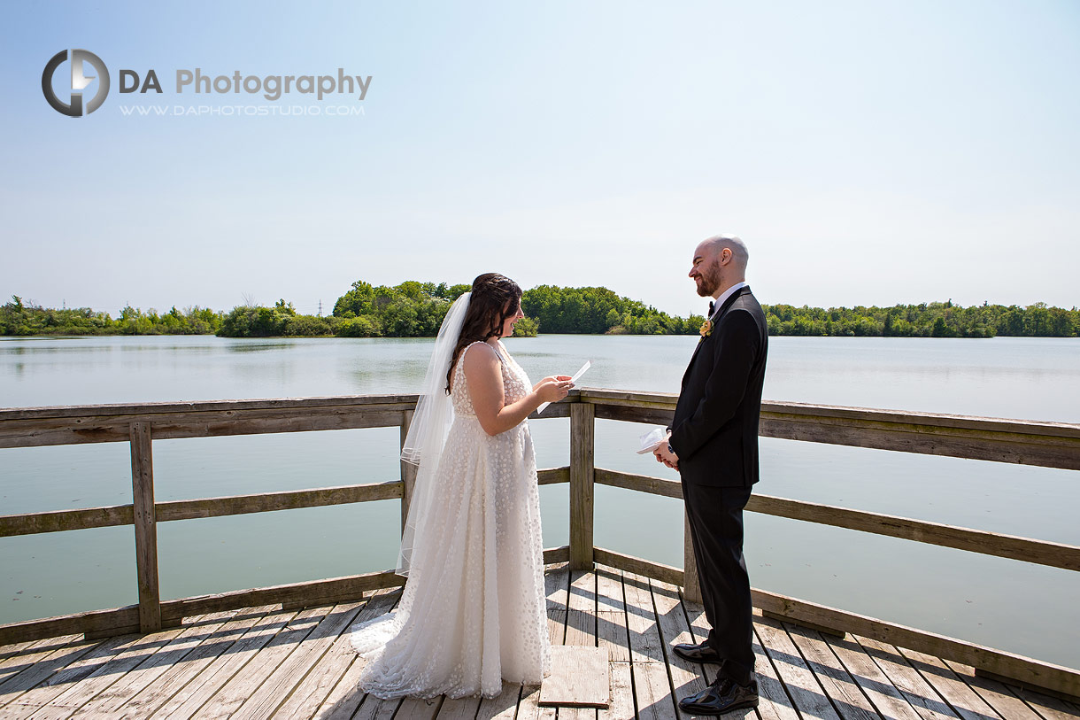 Bride reads her vows on the boardwalk at Mel Swart Lake Gibson Conservation Park