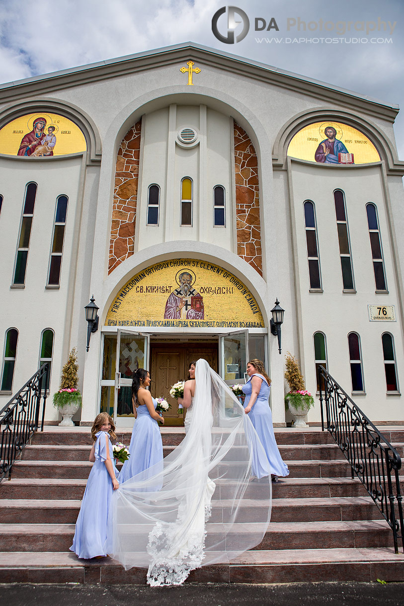 Bridesmaids at the stairs in from of St. Clement of Ohrid Macedonian Orthodox Cathedral