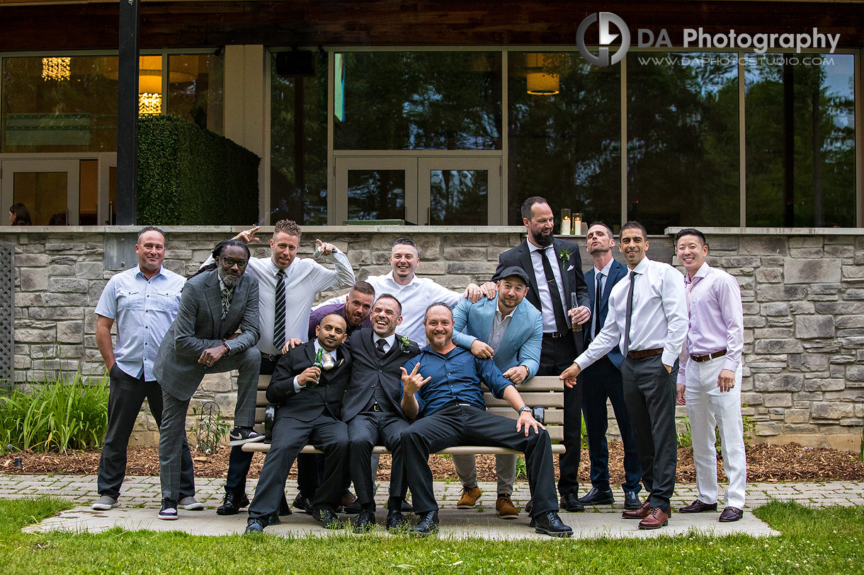 Fun photo of groom's friends during a cocktail hour